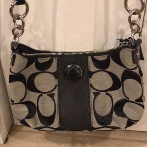 Black and grey Coach crossbody